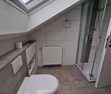 Gemütliche 2ZKB-Dachgeschosswohnung mit Loggia und Einbauküche - Foto 1