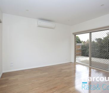 Beautiful 2-Bedroom Home with Natural Light and Modern Amenities - Photo 1