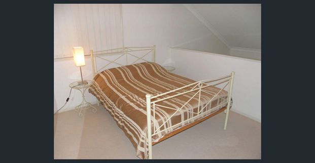 Beat the heat by the pool this summer in this 1 bedroom loft style property - Photo 1