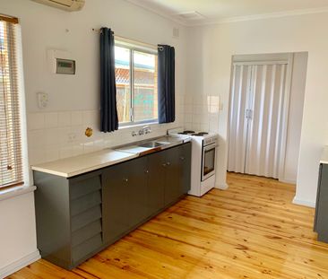 Spacious Unit in Perfect Location! - Photo 5