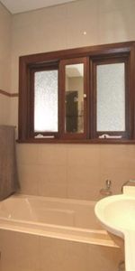 Family House in Ultra-Convenient Location ** Available 05/12/25 ** - Photo 3