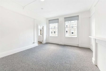 A brilliant studio flat in a prime South Kensington location with shared bathroom facilities. - Photo 2