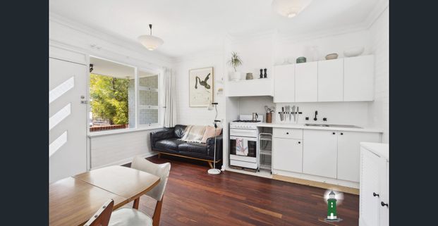 One Bedroom Duplex with Studio - Photo 1