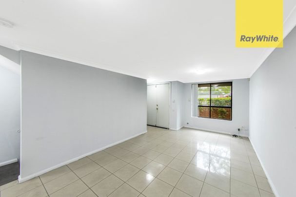 Spacious Tri-Level Townhouse - Light-Filled and Conveniently Located - Photo 1