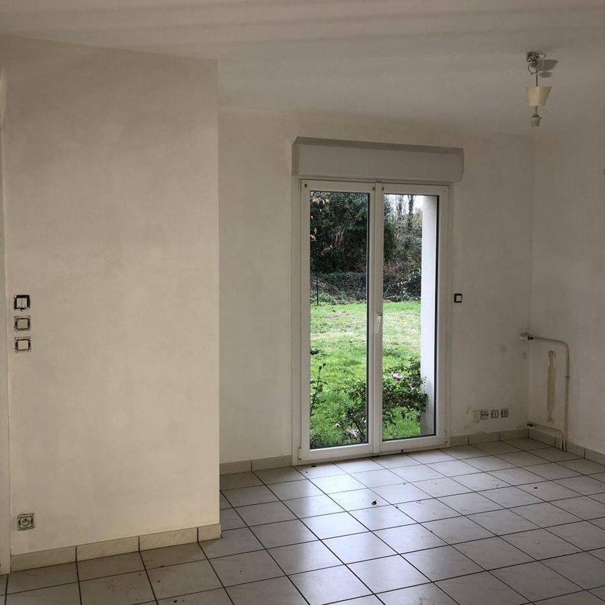 A LOIUER BOUGUENAIS LES COUETS GAUDINIERE - Maison T6 - 4 chambres - garage et jardin - Photo 1