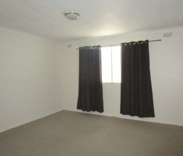 Spacious Ground Level Two Bedroom Unit - Photo 1