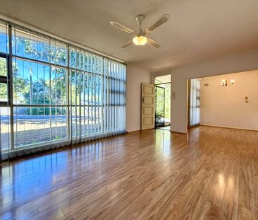 Spacious Family Home with Generous Yards in Prime Location! - Photo 6