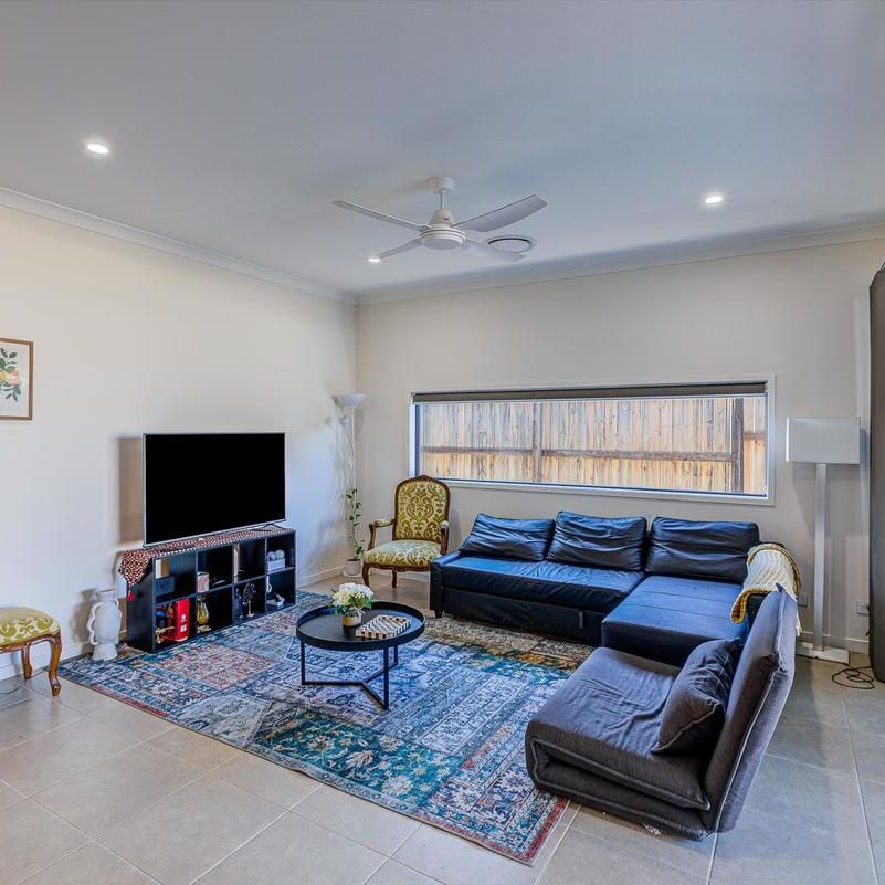 Spacious Family Home with Large Yard in Logan Reserve - Photo 1