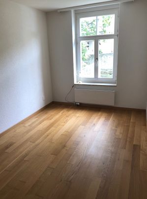 Zentrumsnahe Singlewohnung mit grossem Balkon! - Foto 1