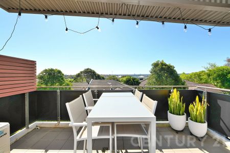 Elevated Luxury with Soaring Ceilings & Water Views - Photo 5