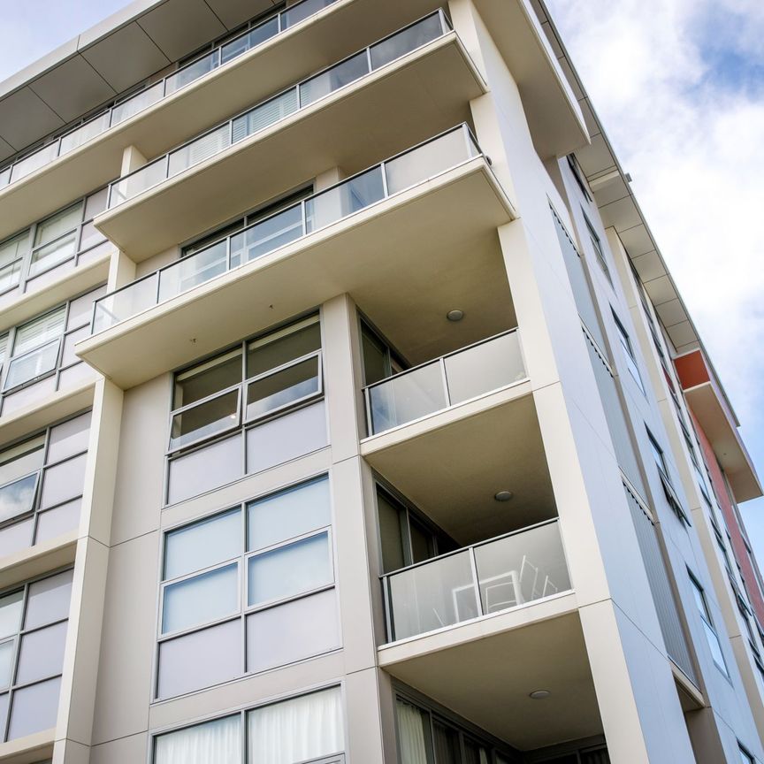 Ducted air-conditioning, district views, and parking for two in a most convenient city location; Spire Apartments - Photo 1