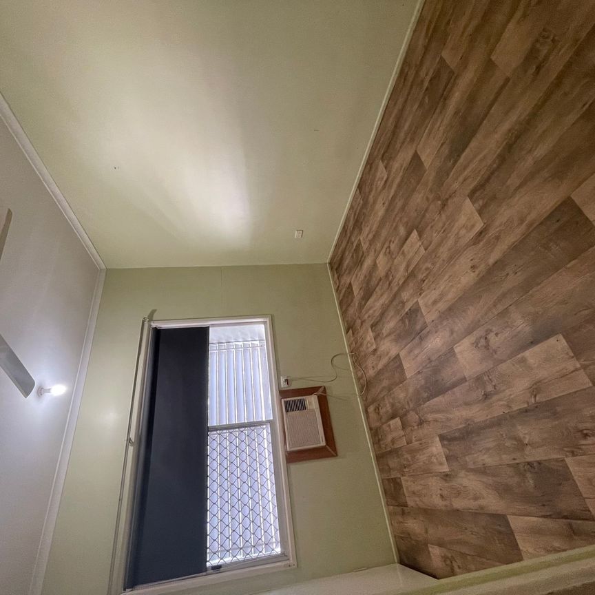 2 Bedroom Duplex with Double Carport - Photo 1
