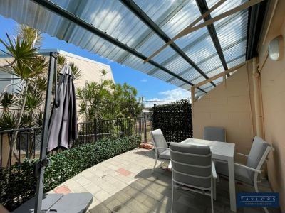 Centrally Located Furnished 2-Bedroom Unit with Pool Access - Photo 3