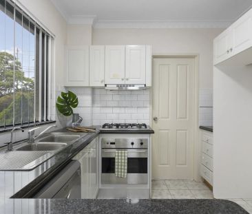 Easy-care living close to endless amenities - Photo 1