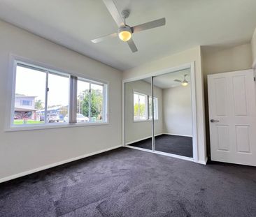 Fully Renovated Family Home with Air Conditioning - Photo 6