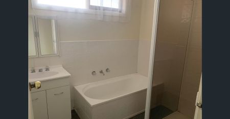 Spacious, Sun-Filled Three Bedroom Unit in a Quiet, Convenient Location - Photo 5