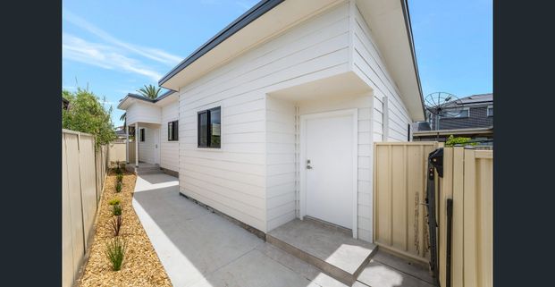 Stylish, Spacious & Super Convenient! - Photo 1