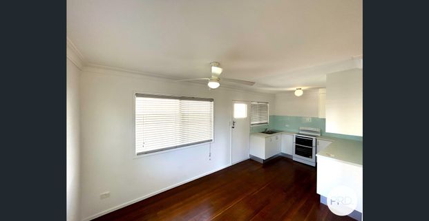 CLOSE TO THE BEACH WITH LARGE YARD & PLENTY OF STORAGE - Photo 1