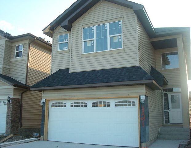 EXECUTIVE HOME 5 BED RMs, 3MASTER BDRMs 4Bath RMs IMMEDIATELY! | 121 Taralake Manor, Calgary - Photo 1