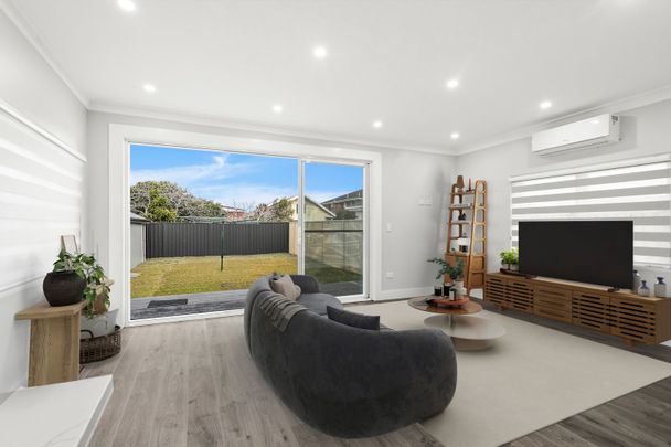 Easy Modern Living in Prized Beachside Pocket - Photo 1