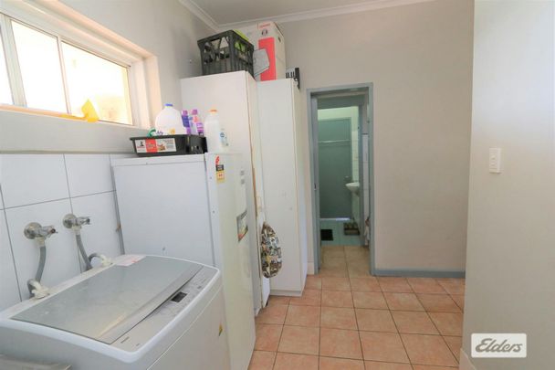 Located close to local shops and Katherine South Primary School, this home combines practicality with lifestyle. - Photo 1