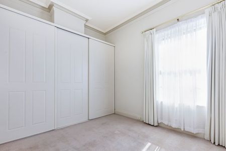 Top-Floor Living with Park Views & Incredible Convenience - Photo 3