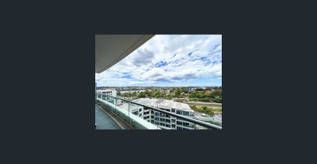 Two-bedroom apartment with stunning water and city views! Partly Furnished! - Photo 5