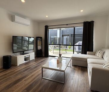 Nestled in the heart of Queenwood, this modern three-bedroom, two-b... - Photo 4