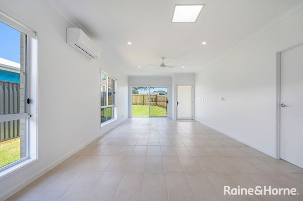 Modern Three-Bedroom Home in a Prime Location - Photo 1