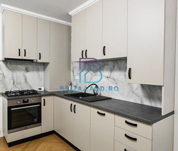 bd. Unirii, Traian, et. 1, sup. 50mp, complet renovat 2025, mobilat - Photo 1