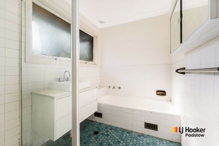 Spacious Two-Bedroom Townhouse in Peaceful, Convenient Location - Photo 4