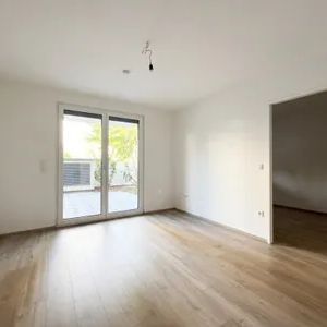 Moderne 2-Zimmer-Wohnung mit kleinem Garten und Kühlung! - Photo 2