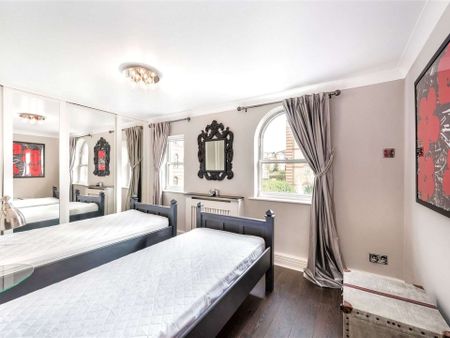A spacious two bedroom apartment in Harrods Village with resident gym and pool facilities plus an allocated private parking space - Photo 5