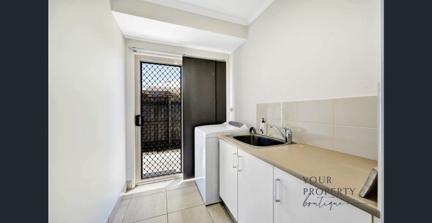 Fully Furnished Coastal Retreat in Bargara - Photo 1