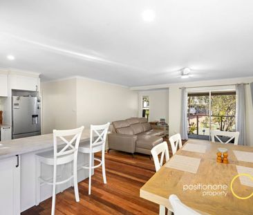 Renovated Family home backing onto peaceful bushlands! - Photo 2