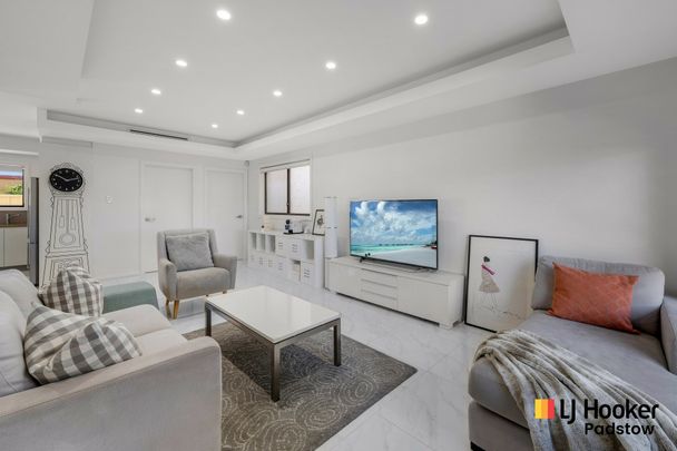 Stylish Four-Bedroom Home in a Prime Location - Photo 1