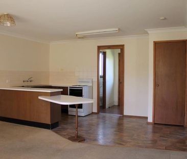 Tidy Two-Bedroom Unit in Peaceful Location - Photo 3