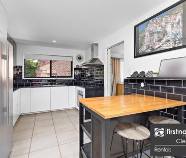 Modern Lowset Family Home with Side Access + Large Shed - Photo 5