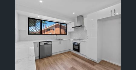 STYLISH LOW MAINTENANCE FAMILY HOME WITH POOL! - Photo 3