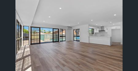 STYLISH LOW MAINTENANCE FAMILY HOME WITH POOL! - Photo 5