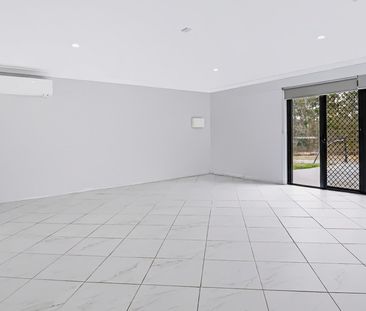 Back Property - Spacious Family Living with Solar, Water Tanks & Mo... - Photo 3