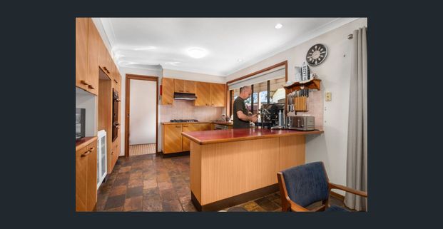 FOUR BEDROOM HOME WITH AMPLE STORAGE - Photo 1