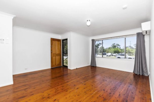 TIDY THREE BEDROOM HOME IN IDEAL LOCATION - Photo 1