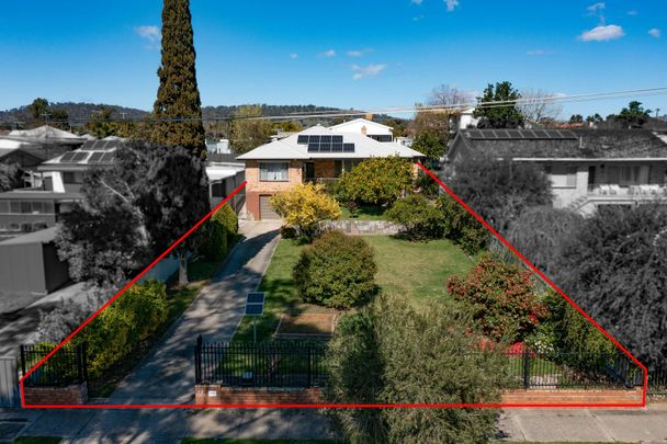 Solid three bedroom home with modern updates - Photo 1