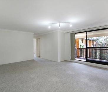 SPACIOUS TWO BEDROOM UNIT ON TOP FLOOR - Photo 2
