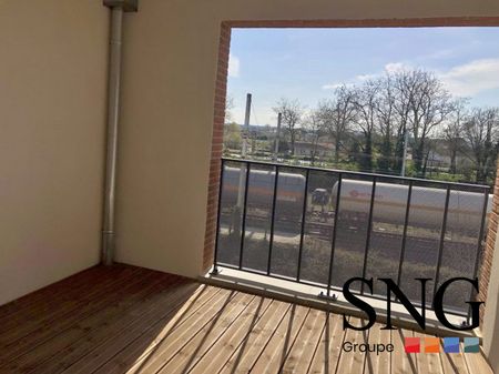 T2 AVEC LOGGIA ET UN PARKING INTERIEUR - Photo 3