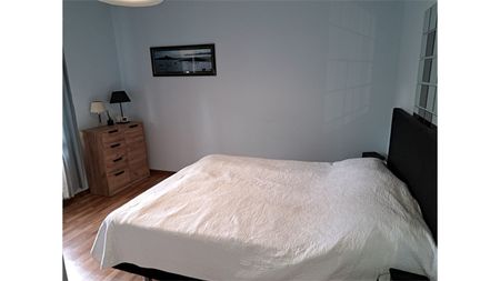 Een appartement op de eerste verdieping met garage en tuintje - Foto 3