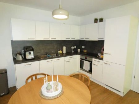 Gemütliche 2-Zimmer-Wohnung im Erdgeschoss mit Einbauküche und Terrasse - Photo 4