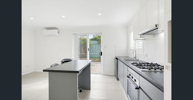 Comfortable Two-Bedroom Home with Spacious Outdoor Area - Photo 1