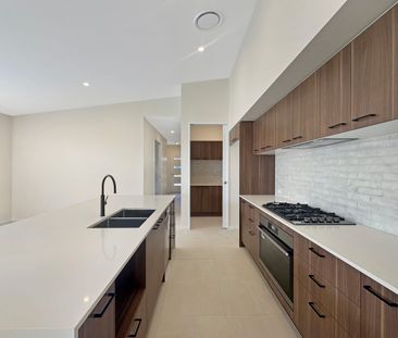 Brand New Four-Bedroom Home in a Sought-After Location - Photo 4